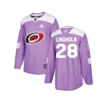 Men Adidas Carolina Hurricanes #28 Elias Lindholm Purple Authentic Fights Cancer Stitched NHL Jersey