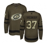 Men's Carolina Hurricanes #37 Andrei Svechnikov Green Salute to Service Stitched Hockey Jersey