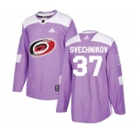 Men's Carolina Hurricanes #37 Andrei Svechnikov Purple Fights Cancer Stitched Hockey Jersey