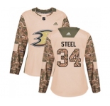 Women Anaheim Ducks #34 Sam Steel Authentic Camo Veterans Day Practice Hockey Jersey