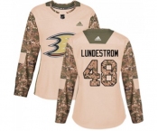 Women Anaheim Ducks #48 Isac Lundestrom Authentic Camo Veterans Day Practice Hockey Jersey