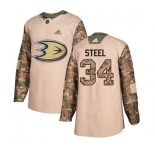Youth Anaheim Ducks #34 Sam Steel Authentic Camo Veterans Day Practice Hockey Jersey
