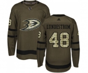 Youth Anaheim Ducks #48 Isac Lundestrom Authentic Green Salute to Service Hockey Jersey