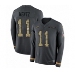 Men's Nike Philadelphia Eagles #11 Carson Wentz Limited Black Salute to Service Therma Long Sleeve NFL Jersey